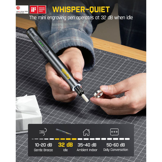 Person using a mini engraving pen on a cutting mat with whisper-quiet.