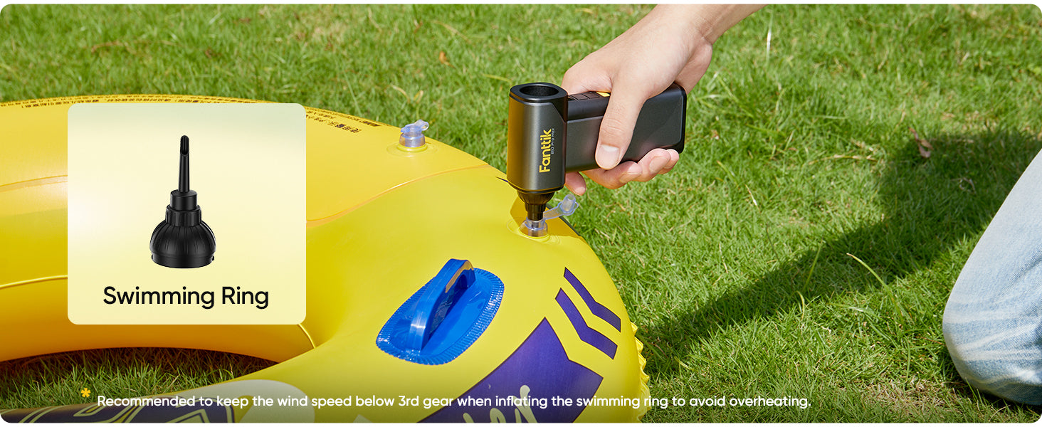 Person inflating a swimming ring with a Fanttik B10 Pro Max Electric Air Duster on grass.