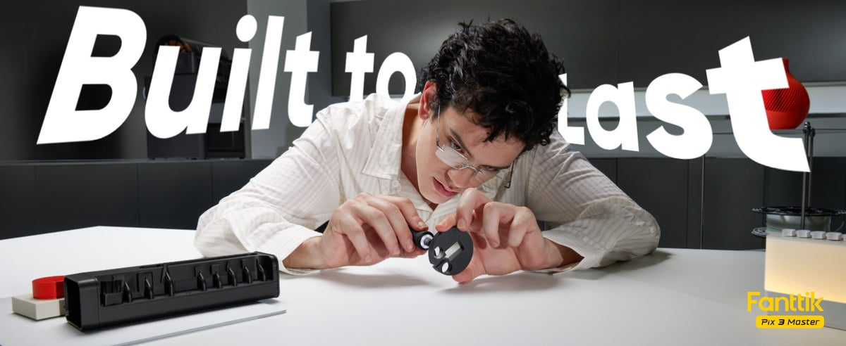 A man is shown closely examining a small product using Fanttik Pix 3 Master Electric Detail Sander with large text reading 'Built to last' in the background and a small yellow 'With Pix 3 Master' mark in the lower right corner.