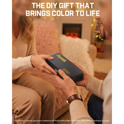 Two people exchanging fanttik F2 Master rotary tool labeled 'Fanttik' in a cozy living room.