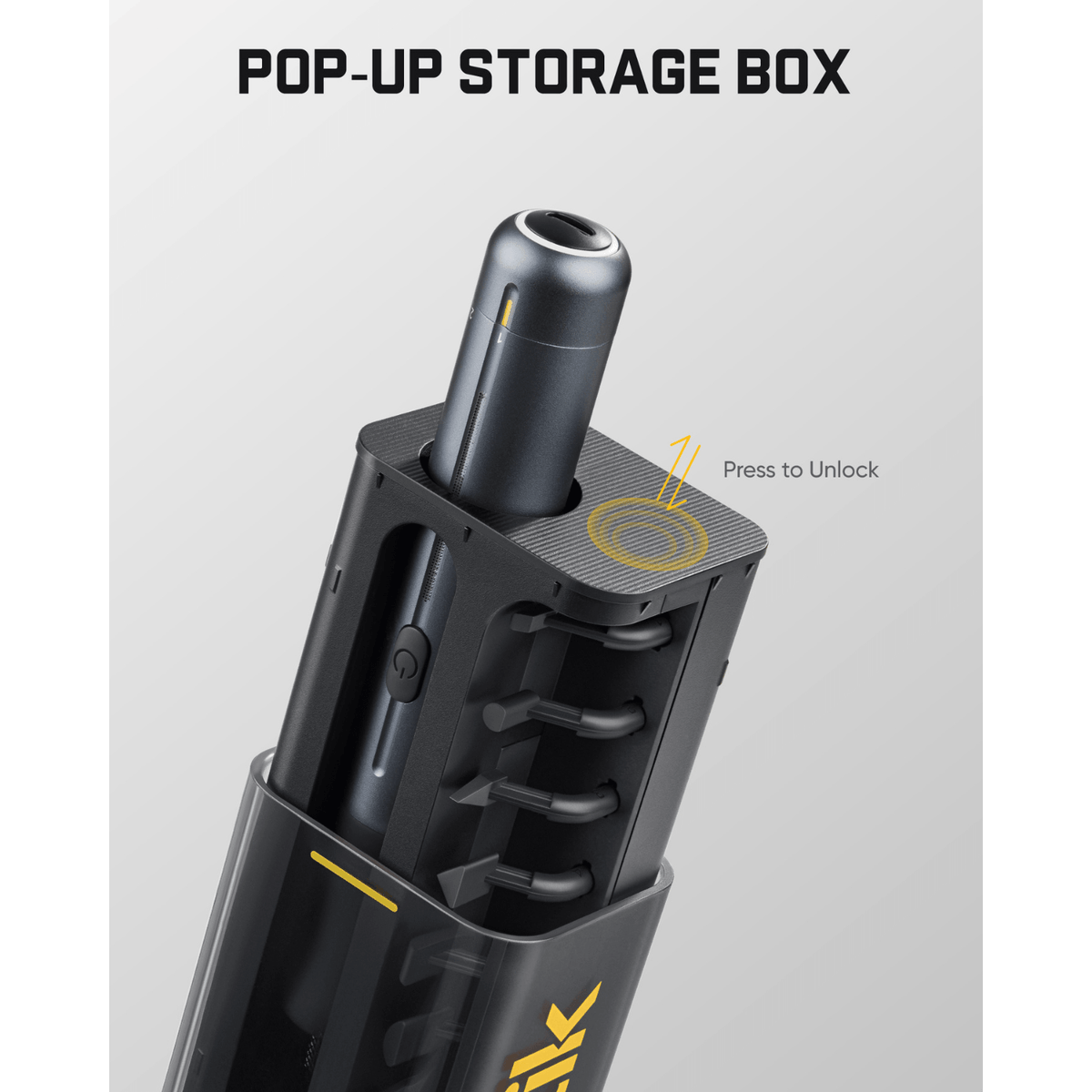 Fanttik Pix 3 Master Electric Detail Sander's pop-up storage box with a cylindrical device inserted into it, is shown on a light gray background with the text 'POP-UP STORAGE BOX' and a 'Press to Unlock' callout.
