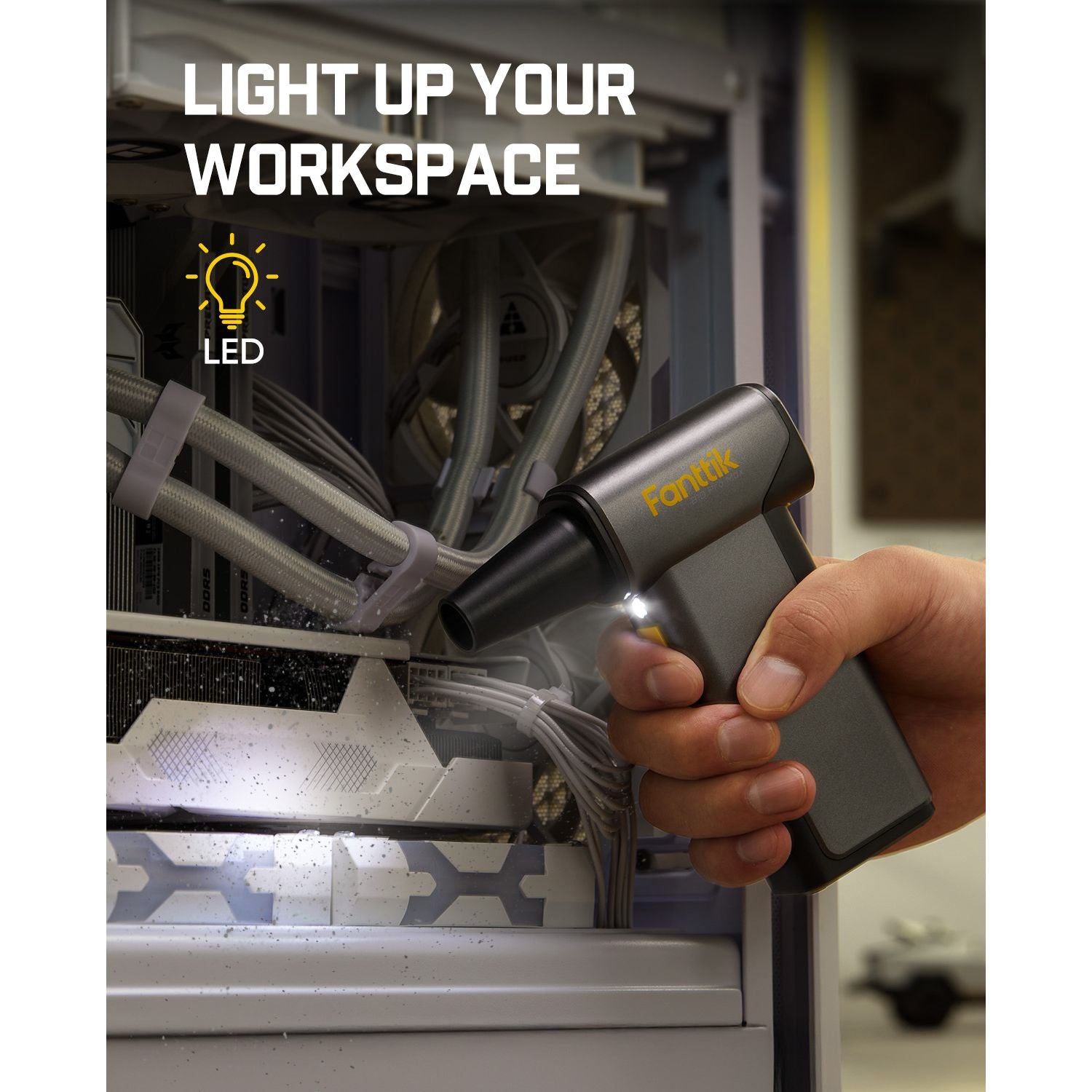 Hand holding a Fanttik B10 Pro Max Electric Air Duster  inside a computer case, text 'Light Up Your Workspace'.