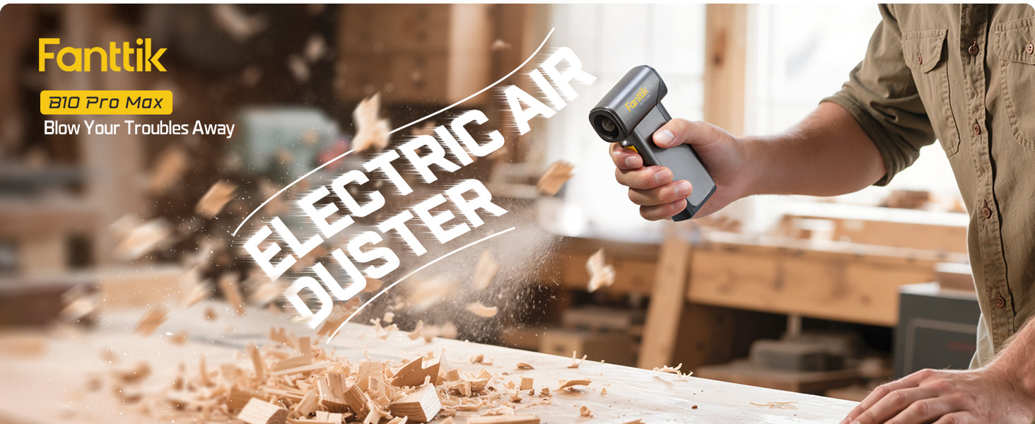 Person using an electric air duster with 'Fanttik' branding in a workshop setting.