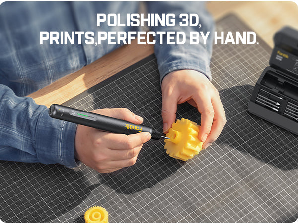 Person using a Fanttik F2 Master Kit Cordless Rotary Tool to polish a yellow object on a grid surface with text about 3D printing.