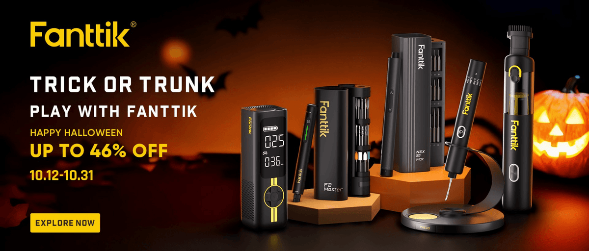 Halloween promotional graphic for Fanttik products, showing several Fanttik DIY tools and auto tools on stands against a dark background with orange pumpkin and bat silhouettes. Large text reads 'Fanttik', 'TRICK OR TRUNK PLAY WITH FANTTIK', 'HAPPY HALLOWEEN UP TO 46% OFF', and 'EXPLORE NOW'.